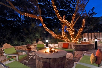 courtyard by marriott cocoa bech terrace & firepit at night