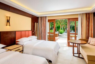 Deluxe Zimmer mit Gartenblick und Twinsize-Bett
