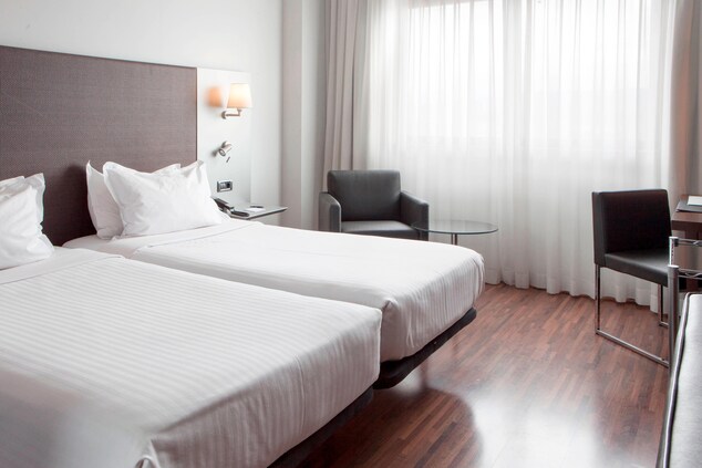 Chambres d'hôtel avec lits simples