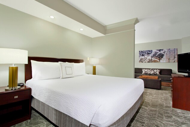 king-sized bed with luxury white bedding