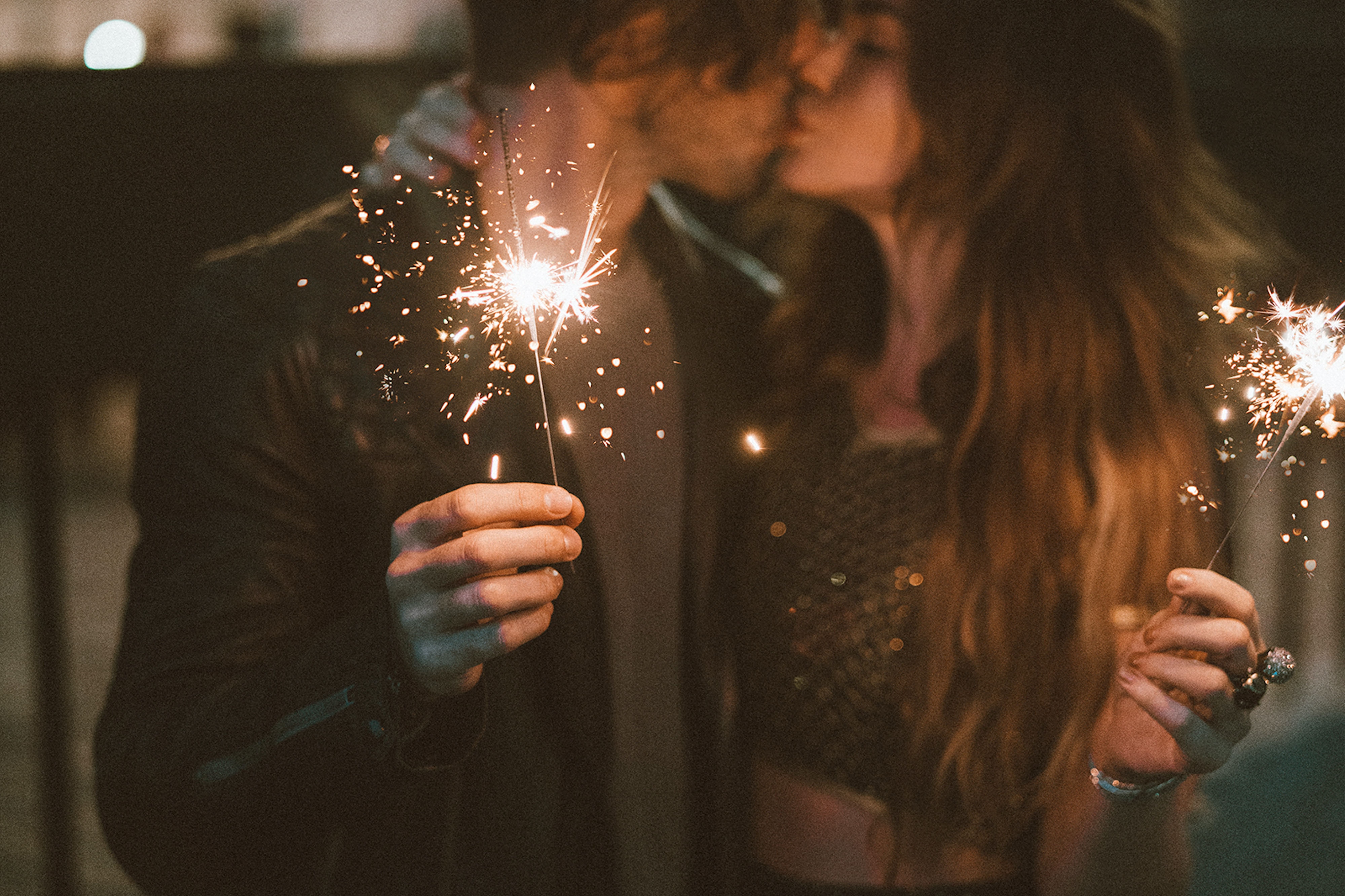Couple Kissing with Sparklers