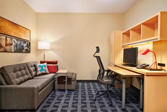 Suite mit Schlafzimmer und Kingsize-Bett – Wohnbereich